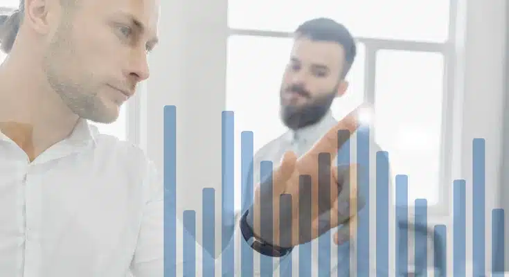 Persona viendo un gráfico de barras - Profitline